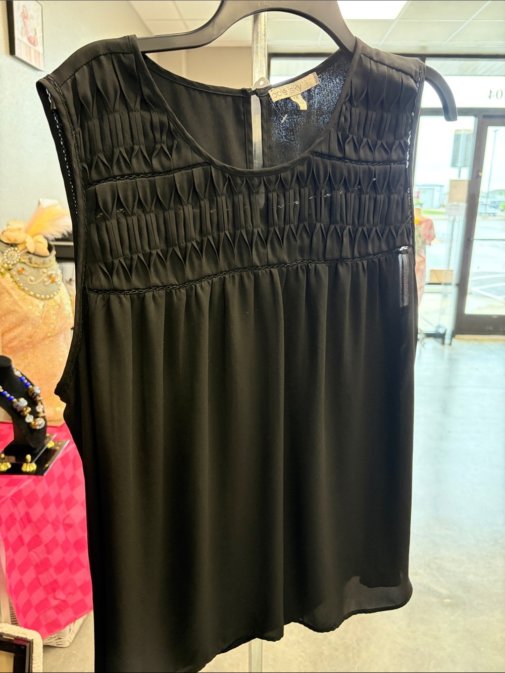 Sleeveless Black Pleated Yoke Blouse